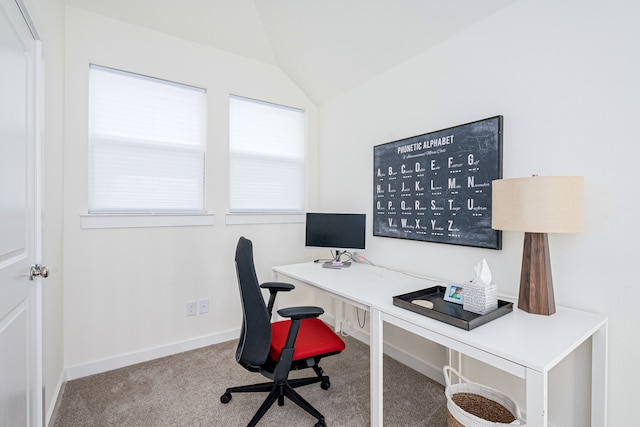 office featuring lofted ceiling and carpet