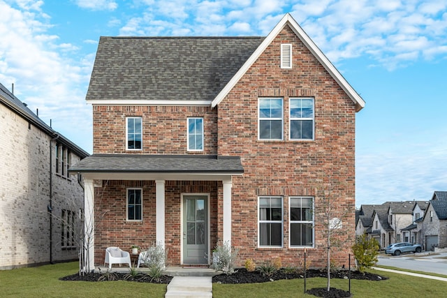 view of front facade featuring a front lawn