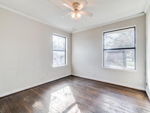 spare room with ornamental molding, ceiling fan, and dark hardwood / wood-style floors