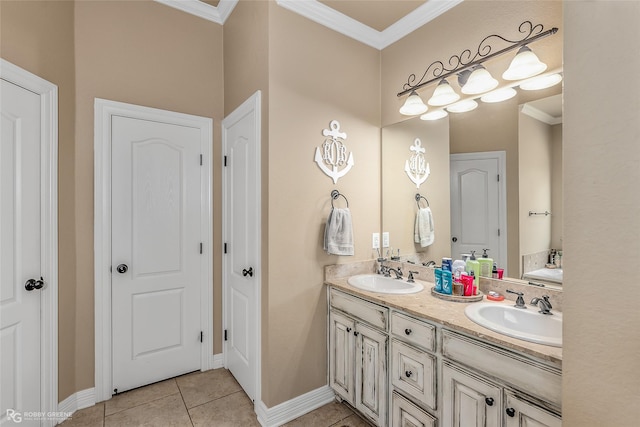 bathroom with tile patterned flooring, ornamental molding, and vanity