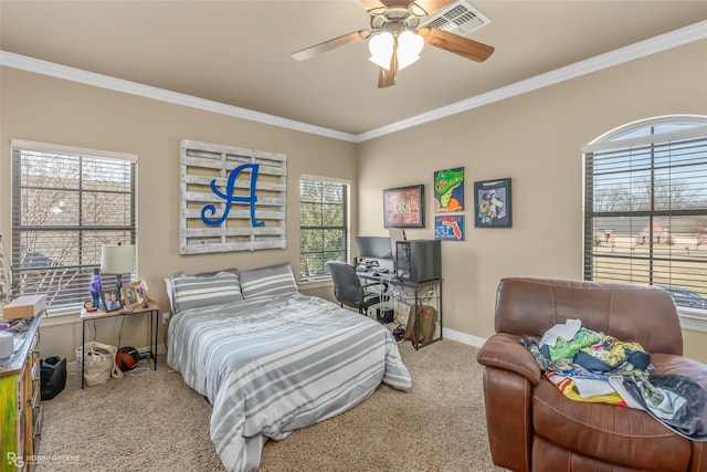 bedroom with light colored carpet, ceiling fan, crown molding, and multiple windows