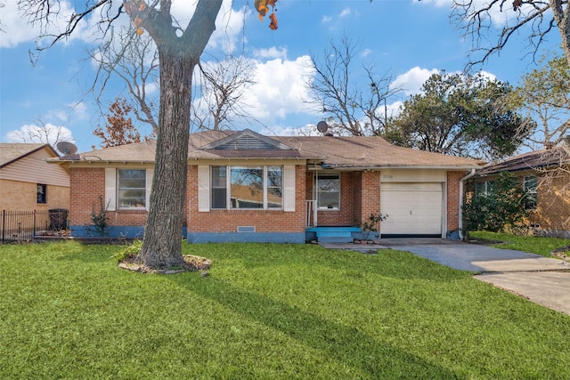 ranch-style home featuring a garage and a front lawn