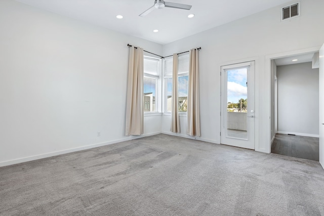 carpeted empty room with ceiling fan