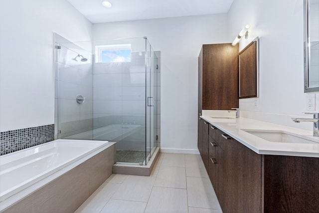 bathroom with vanity, tile patterned floors, and independent shower and bath