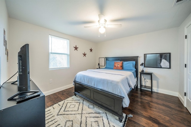 bedroom featuring dark wood-type flooring and ceiling fan