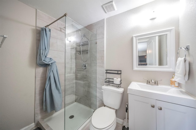 bathroom featuring toilet, curtained shower, and vanity