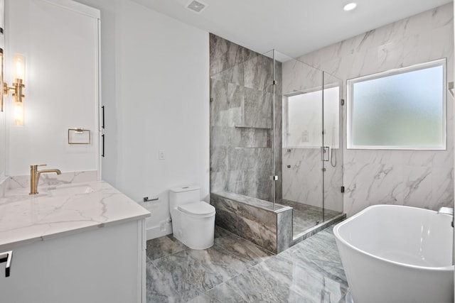 full bathroom featuring toilet, shower with separate bathtub, and vanity