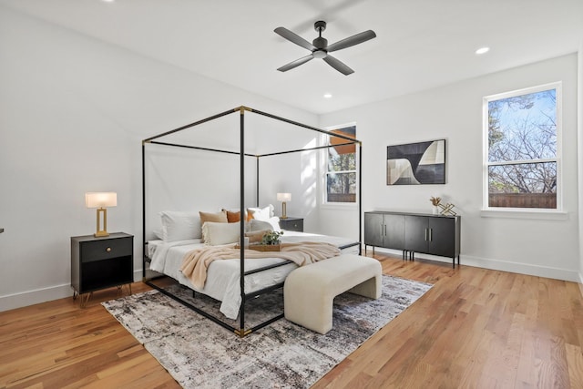 bedroom featuring ceiling fan and wood-type flooring