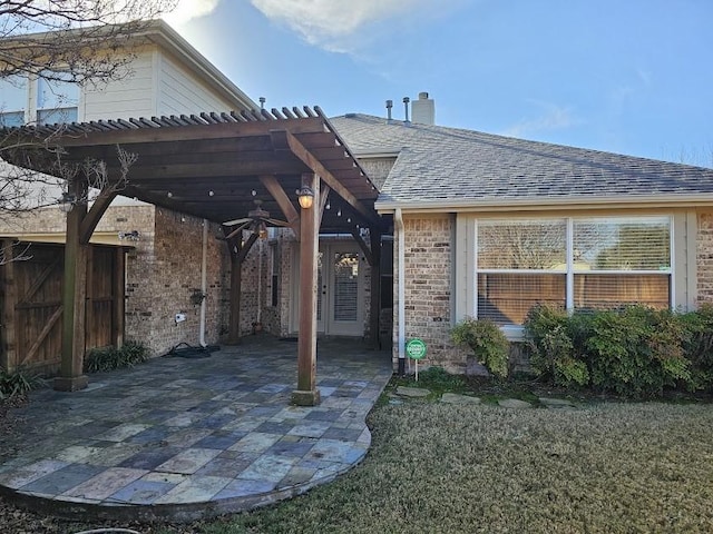 exterior space featuring a yard, ceiling fan, a pergola, and a patio area