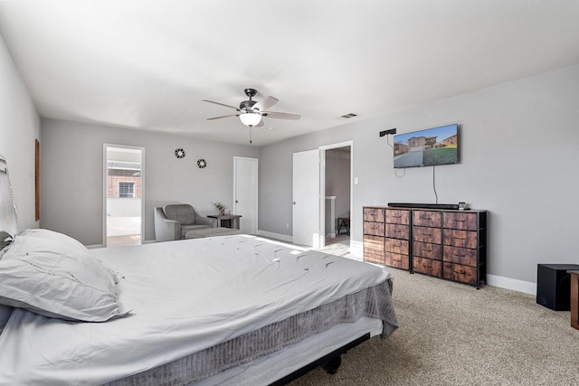 carpeted bedroom with ceiling fan and connected bathroom