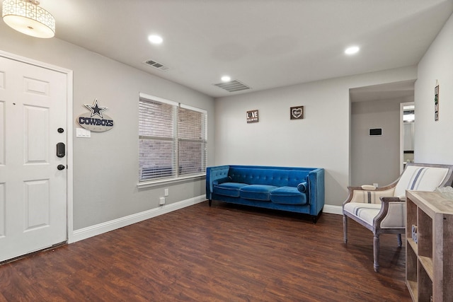 entryway with dark hardwood / wood-style floors