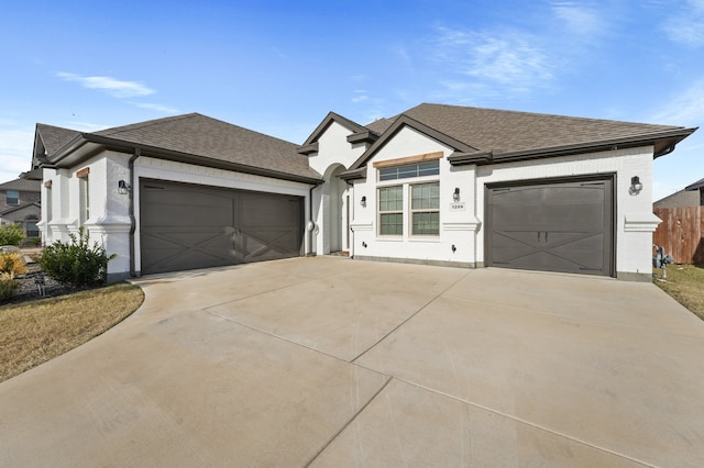 ranch-style home with a garage