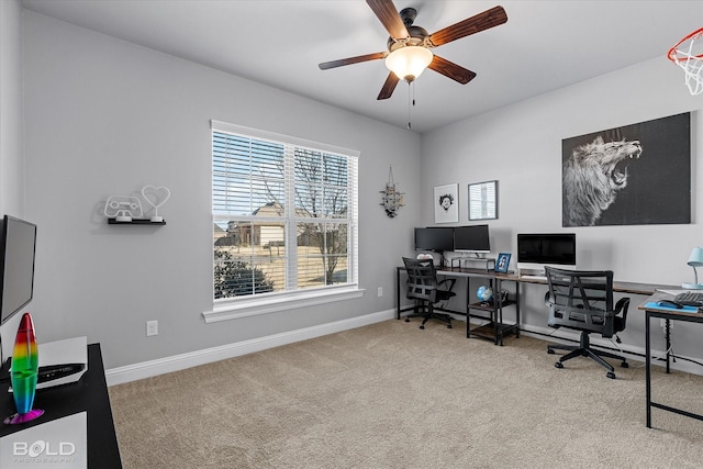 home office featuring ceiling fan and light colored carpet