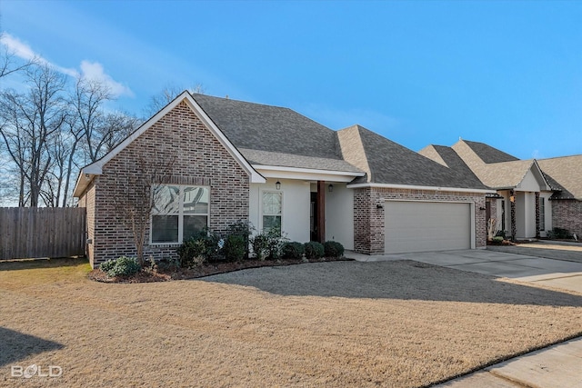 view of front of property featuring a garage