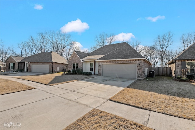 view of front of house with a front lawn and a garage