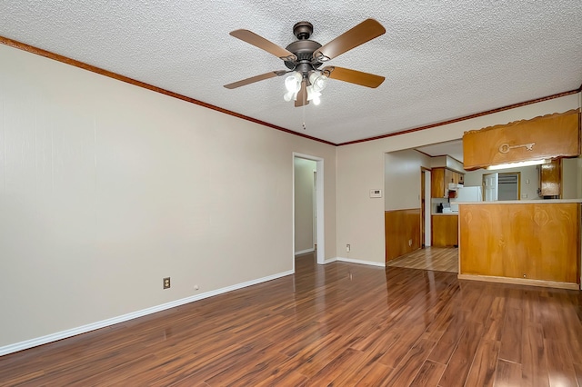 unfurnished living room featuring ceiling fan, crown molding, a textured ceiling, and hardwood / wood-style flooring