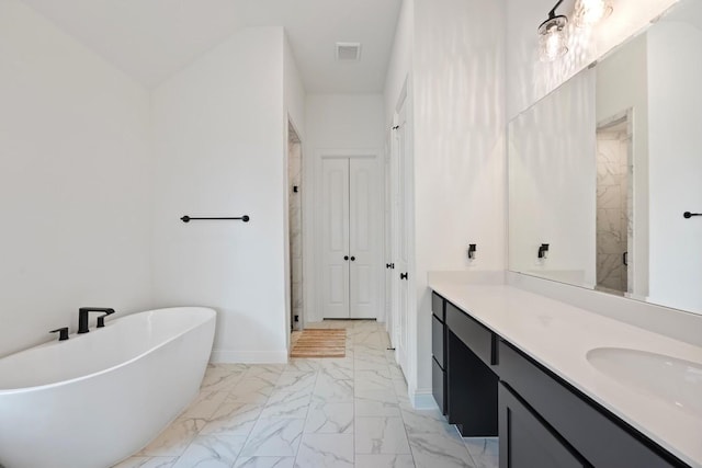 bathroom featuring vanity and plus walk in shower