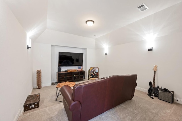 home theater with light colored carpet