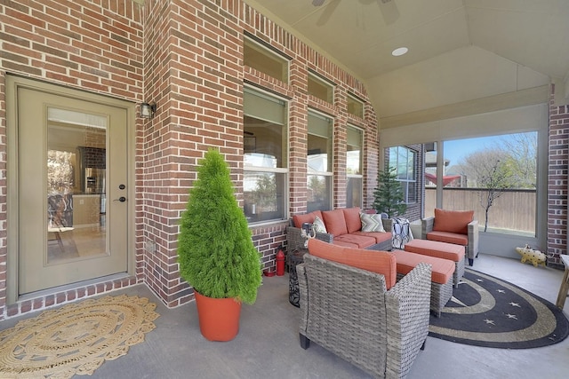 view of patio with ceiling fan and an outdoor hangout area