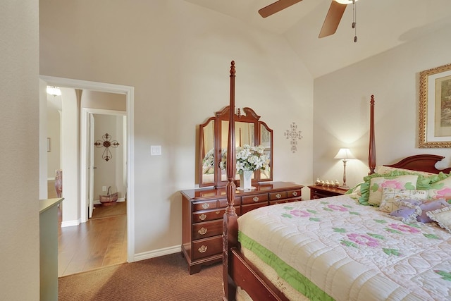 bedroom featuring vaulted ceiling, ceiling fan, carpet, and baseboards