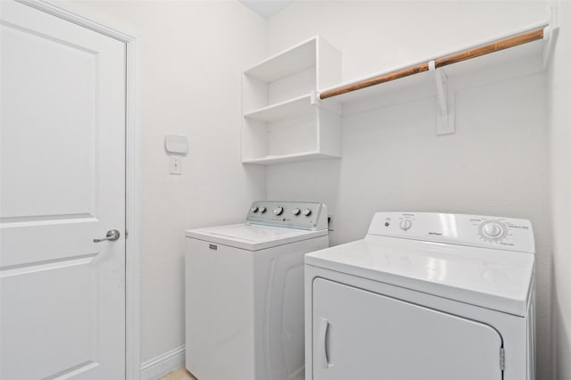 laundry area featuring washer and dryer and laundry area