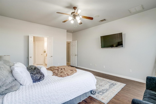 bedroom featuring dark wood-type flooring and ceiling fan