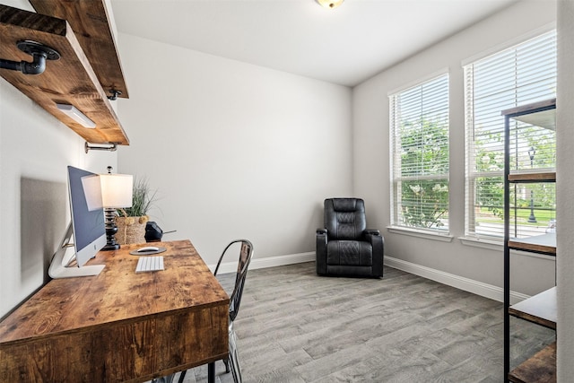 office area with light wood-type flooring