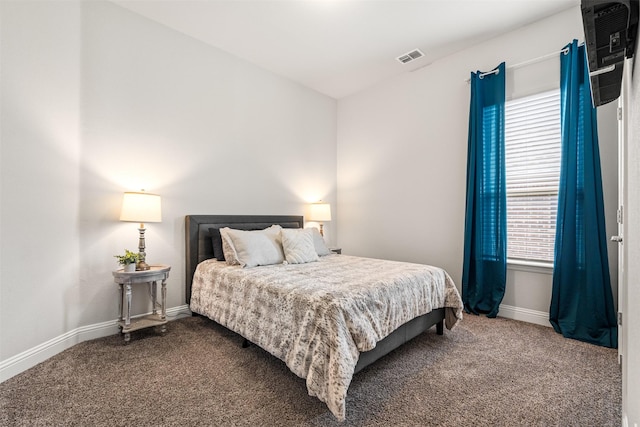 bedroom featuring carpet