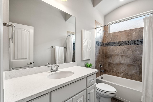 full bathroom with vanity, toilet, and shower / tub combo