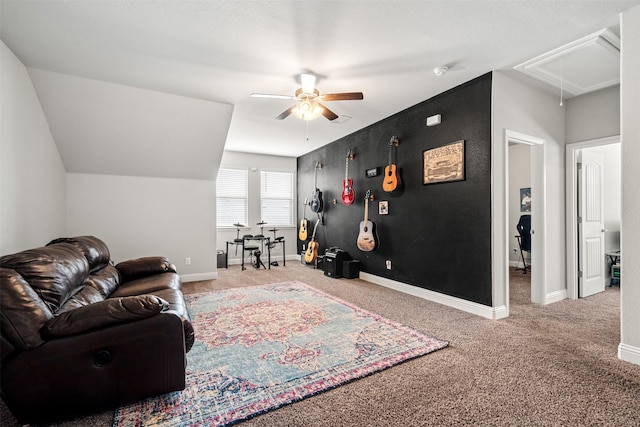 carpeted living room with ceiling fan