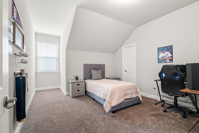 carpeted bedroom featuring vaulted ceiling