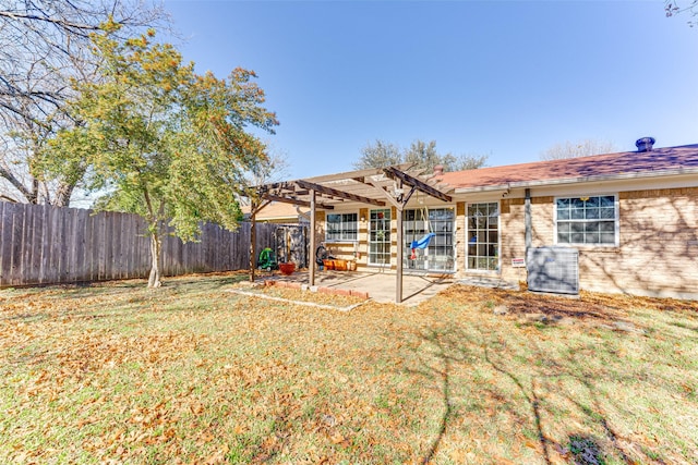 back of property featuring a pergola, a lawn, a patio, and central air condition unit