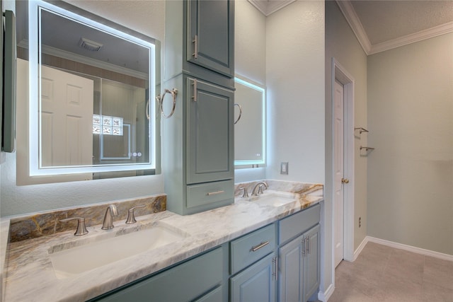 bathroom with vanity, tile patterned flooring, and crown molding