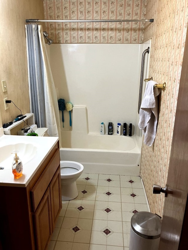 full bathroom featuring shower / bath combo, tile patterned floors, vanity, and toilet