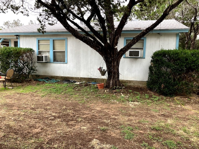 view of home's exterior featuring cooling unit