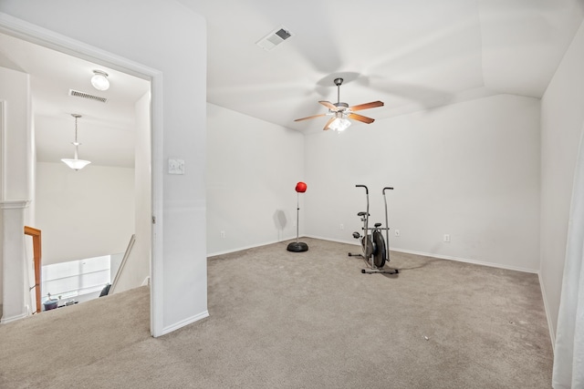 workout area with lofted ceiling, carpet floors, and ceiling fan