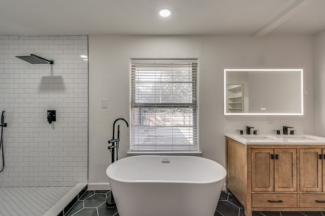 bathroom featuring independent shower and bath, tile patterned flooring, and vanity