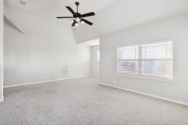 unfurnished room with lofted ceiling, carpet floors, and ceiling fan