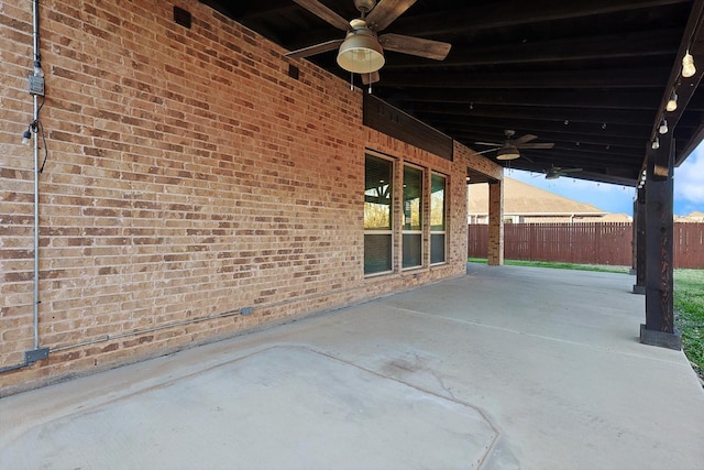 view of patio featuring ceiling fan