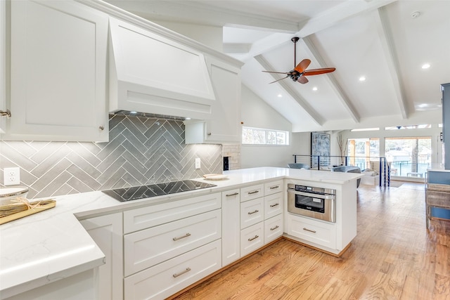 kitchen featuring white cabinets, vaulted ceiling with beams, tasteful backsplash, kitchen peninsula, and custom exhaust hood