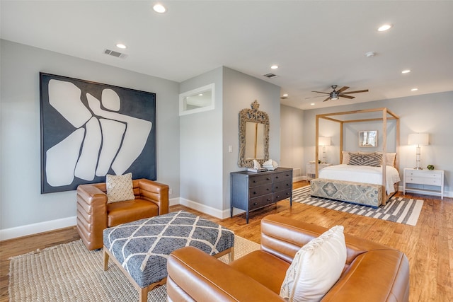 bedroom featuring hardwood / wood-style flooring and ceiling fan