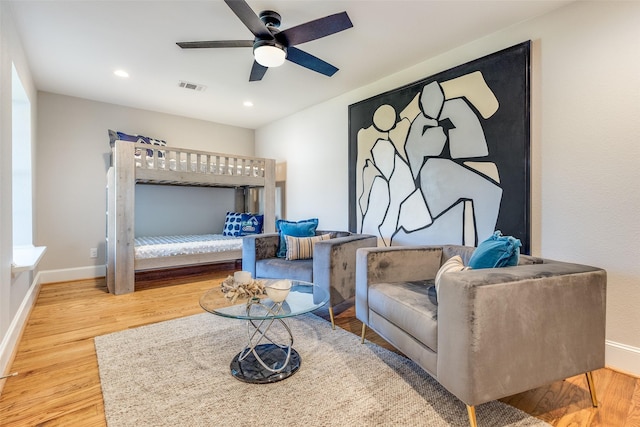 bedroom featuring ceiling fan and hardwood / wood-style floors