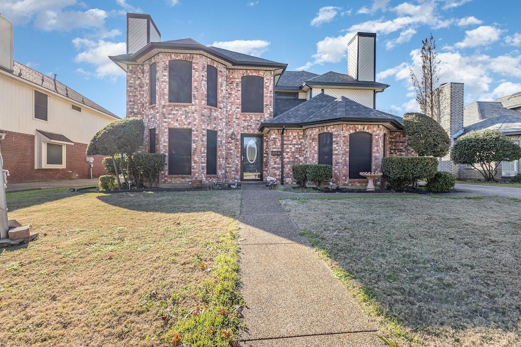 view of front of house with a front yard