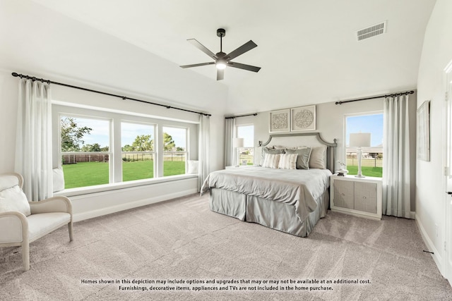 bedroom featuring ceiling fan and light carpet