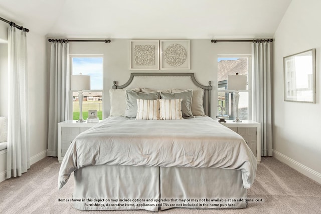 bedroom featuring vaulted ceiling and light carpet