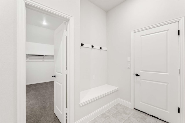 mudroom featuring baseboards