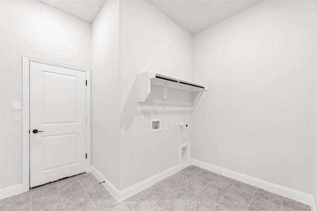 laundry area with baseboards, hookup for a washing machine, hookup for a gas dryer, electric dryer hookup, and laundry area