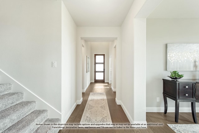 hallway with wood-type flooring