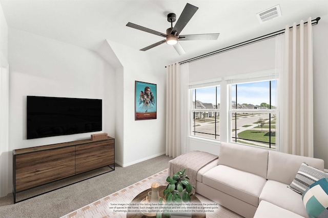 carpeted living area with baseboards, visible vents, and ceiling fan