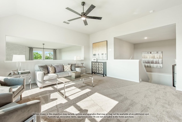 carpeted living room featuring ceiling fan